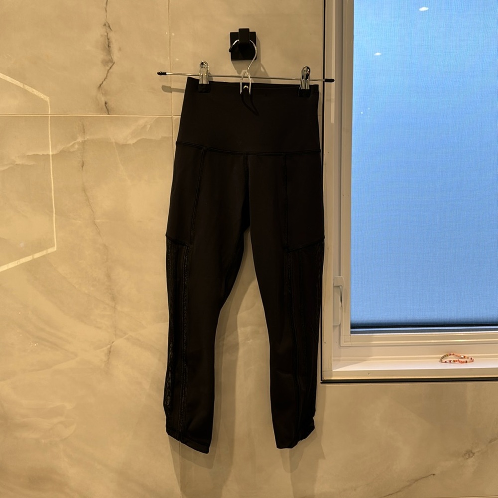 Lululemon high waist ,  mid calf leggings with mesh sides and detail